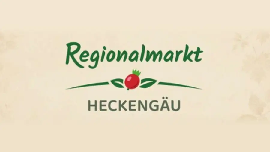 Logo des Regionalmarkts Heckengäu — der Schriftzug mit einer roten Hagebutte zwischen zwei Blättern.